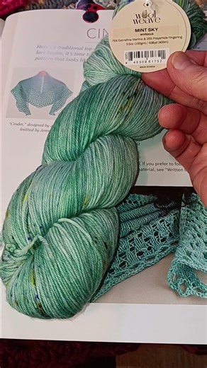 My first shawl knitting project with a fingering weight yarn, love the color