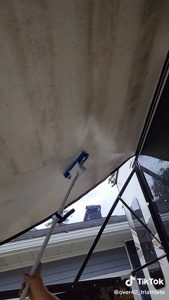 This is how to clean your RV awning easier and faster than ever before. #rvhacks #ilovetocamp #puremichigancamping #magiceracer #cleancamper #camperhack