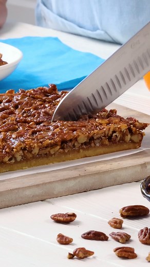 All the pecan pie flavor you love, with none of the mess! These portable Pecan Pie Bars are sticky and sweet little bites of heaven. #pecanpiebars #pecanpie Recipe: https://www.dixiecrystals.com/recipes/pecan-pie-bars | Dixie Crystals