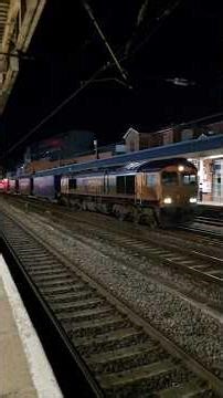 GBRF Class 66 number 66310 (Bo'ness and Kinneil Railway) thrashing through Doncaster Station