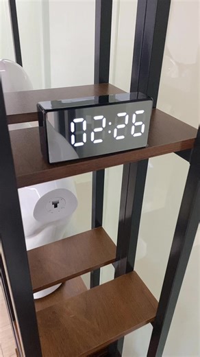 It looks like a regular alarm clock. But it's actually an HD spy camera; you connect it to Wi-Fi and watch everything with your phone. It has night vision and motion detection features, making it perfect for monitoring your house when you're not home.