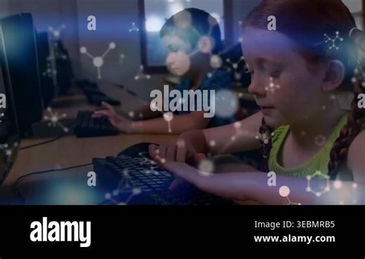 Animation of molecular structures floating over caucasian girl using computer in the class at school. School and education technology concept Stock Video Footage - Alamy