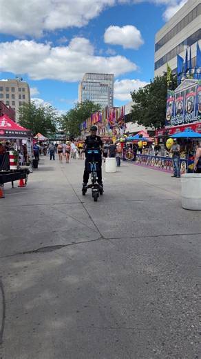 Have you seen a #FargoPD officer riding a Trikke in #DowntownFargo? Officer Lacey Bunkelman shares how these agile rides help us on patrol and how they're being used at the Downtown Fargo Street Fair to connect with attendees and enhance public safety. | Fargo Police Department