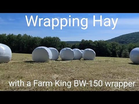 Wrapping Round Hay Bales with a Farm King BW-150 Wrapper and Massey Furguson and Mahindra tractors