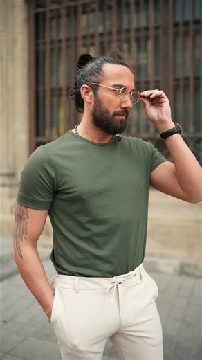 Men's Spring Casual Outfit, Green t-shirt paired with Beige Pants and khaki suede loafers.