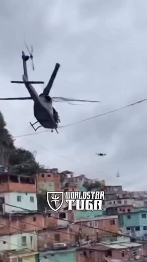 🚨🚨Este vídeo mostra Policiais derrubando um drone que estava a ser usado pela máfia Comando Vermelho , para atacar as forças militares. 🇧🇷 #praytoriodejaneiro @worldstartugaa #riodejaneiro #worldstartuga #brazil #news #viral | worldstar.pt