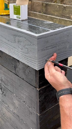 Just starting to board all this timber off with @millboard mitre cuts etc #millboard #landscaping #cladding | Wulstan Fencing & Landscapes