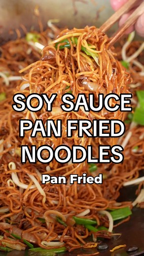 These soy sauce pan fried noodles are stir fried with a savory sauce tossed with crisp vegetables. This simple but delicious noodle dish is extremely customizable and can be ready on the dinner table in just 15 minutes! Find the full recipe with all my key tips on the blog - link in my profile! #easyrecipes #cookingvideo #cooking #noodles #chinesefood #cjeatsrecipes