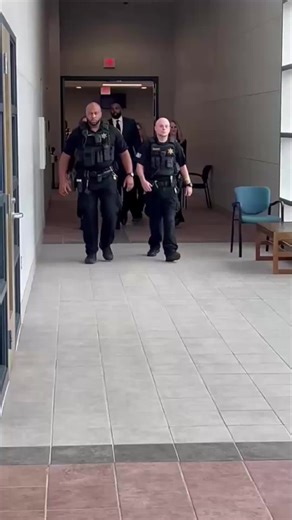 Ex-Michigan coach Sherrone Moore walks hand-in-hand with his wife as he arrives in an Ann Arbor court for his latest hearing. The hearing was scheduled to begin at 11 a.m. but hadn't started as of noon. Follow Freep.com for the latest updates. 📹 Video by Dave Boucher, Detroit Free Press. #sherronemoore #michigan #annarbor