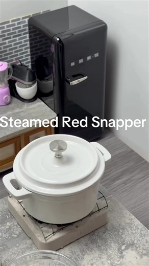 Steamed red snapper with curry, coconut milk served over Jamaican excelsior crackers. #fyp #foodie #minivlog #mini #miniature