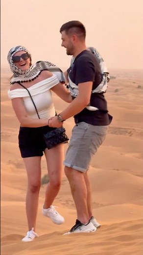 Lovely couple . red sand desert safari photography VIP premium desert safari