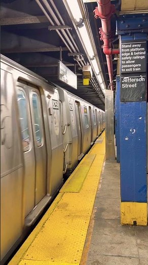 NYC MTA L train subway pulling into Jefferson Street station Bushwick, Brooklyn.