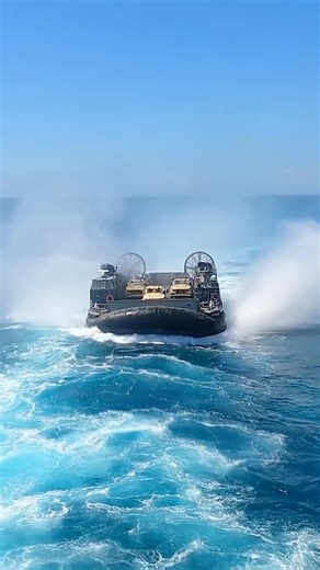 An LCAC hovercraft can carry up to 60–75 tons roughly the weight of a MBT or about 3 fully loaded city buses moving that load straight from ship to shore. They travel over water and drive straight onto land, gliding over sand, mud, marshes, ice, and even shallow obstacles thanks to their air cushion. That’s the game-changer compared to D-Day–era landing craft 🤯 #history #WWII #navy #military #MilitaryTech | Frontline Diary