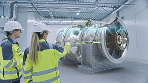 Industry 4.0: Two Engineers Standing, Talking in Factory Workshop with Augmented Reality 3D Model Engine, Analysing Components, Fuel Use Efficiency. VFX Special Visual Effects, Graphics Visualization