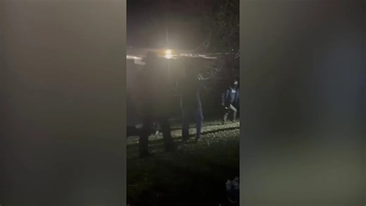 Federal immigration officer tangles with protester in Colorado clash