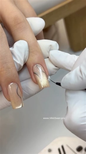 Russian Manicure Online Courses | Hard Gel Classes | Pedicure on Instagram: "New Year cat eye Russian manicure tutorial with soft metallic lines✨ Clean cuticle work, perfect architecture and deep magnetic shine. I love how cat eye designs look different in every light — soft, elegant and festive at the same time. Just clean technique, balance and glow. Relax, enjoy the process and feel the ASMR ✨🤍 Save this video for your holiday nail inspiration 🎄 . #nailtutorials #russianmanicure #nailinspo 
