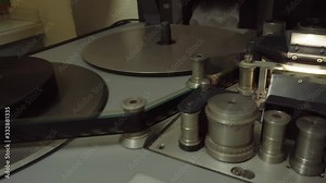 A synchronize for film assembly processing.Film Movie production tools.Audio video industrial film synchronizer for movie post production Stock Video