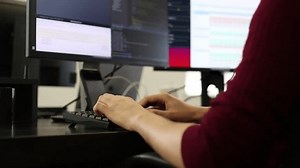Programmer Working Dual Monitors Typing Code Stock Footage Video (100% Royalty-free) 3801579293 | Shutterstock