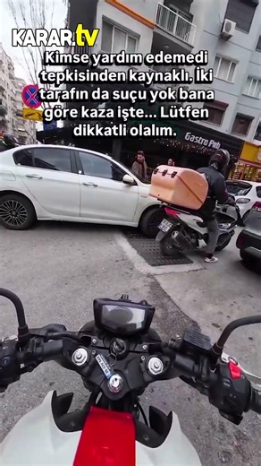 A pedestrian who fell while crossing the street in Izmir narrowly escaped being run over. #shorts