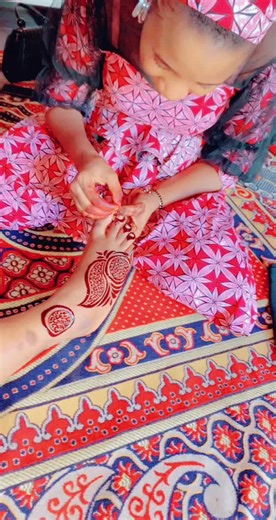 Intricate Henna Design Application on Feet