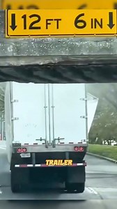 This truck gets stuck under a 12’6” bridge after missing the height warning sign. A clear reminder for drivers to always know their rig’s height before rolling. #truck #trucking #automobile #trucker #truckdriver #trailer | driving skill