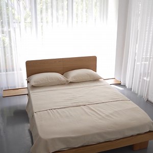 The Sera Bed is crafted from solid White Oak or Walnut with Scandinavian-inspired elegance. | Moss Design