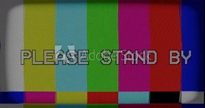 Please Stand By screen text Signal on the CRT Tv screen - 4K infinite loop animation.