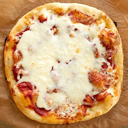 A basic recipe for Gluten Free Pizza Dough is one of the single most important staples to have in your kitchen. It's super simple to make, freezes well, and defrosts easily. 🍕 Once you make this recipe, you'll see why it's a permanent resident of my family's Friday night dinner rotation! https://glutenfreeonashoestring.com/gf-pizza-dough/ | Gluten Free on a Shoestring