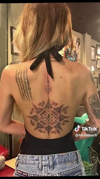 A Sak Yant is a sacred Southeast Asian tattoo combining Buddhist prayers, animist spirits, and geometric patterns. Rooted in the ancient Khmer Empire, these hand-poked marks are believed to act as spiritual armor, granting the wearer protection, courage, and good fortune. #thailand #sakyant #fyp #for3stlov3r #psychology