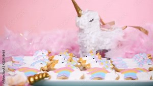 Unicorn sugar cookies decorated with royal icing at the kids birthday party