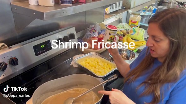 Ashley with @Midnight_blue_bowfishing cooking up a Softshell Shrimp Fricasse in downtown Leeville, LA #makeitpop #rouxdoctor #makeitpop #shrimp #cajunlife #louisiana #bayou #pop #fish #fyp #trending