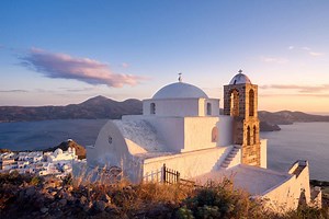 This Might Be the Most Photogenic Island in Greece — With a Moon-like Landscape, Gorgeous Sea Caves, and Some of the Bluest Water You've Ever Seen