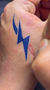 202K views · 2K reactions | Minimal, modern and full of power ⚡ Clean lines + bold colors = pure hand-ink magic. If you love sharp, energetic tattoo designs — this one’s for you!” | Sonu Kumar | Facebook