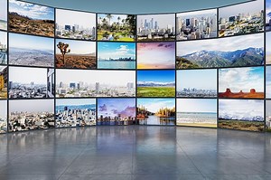 Premium Photo | Creative video wall in television production room as technology concept with colorful screens and various images TV monitors on light room with reflections on floor 3D Rendering