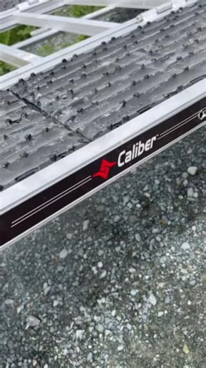 The Caliber Ramp-Pro 2.0 Universal ATV & Snowmobile Ramp, the...