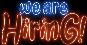 We Are Hiring text font with light. Luminous and shimmering haze inside the letters of the text We Are Hiring. We Are Hiring neon sign.