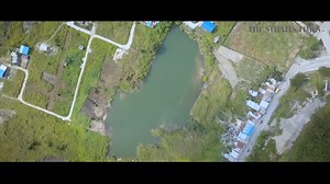 16K views · 50 reactions | Samarinda, the provincial capital of Indonesia's East Kalimantan, is home to 1,375 abandoned coal mines. Left unreclaimed, these water-filled mining pits are a danger to the local community. https://str.sg/JpjL | The Straits Times | Facebook