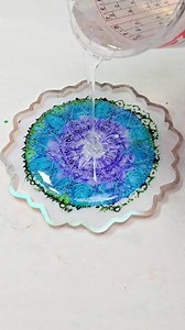 This mandala resin bowl didn't come out quite as planned but I still love it. It's like a tie-dye peacock :) Next time maybe a little less alcohol ink... #resin #mixedmediagirl | Mixed Media Girl