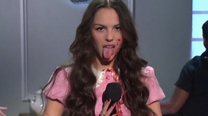 Olivia Rodrigo sets the SNL stage on fire with some cake-smashing and stunning performance