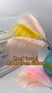 Just finished making these delicate reed tassels using only 10cm satin ribbon. They’re so much easier to create than they look, and perfect for adding a boho touch to bags, keychains, or home decor. What should I make with these tassels first? A bag charm or a curtain tie-back? Let me know your ideas in the comments! ✨ Full tutorial is up on my YouTube channel! 👉Get material here: https://www.zpxribbon.com #RibbonDIY #SatinRibbon #ReedTassel #DIYCrafts #EasyDIY #BohoDecor #Handmade #CraftTutori