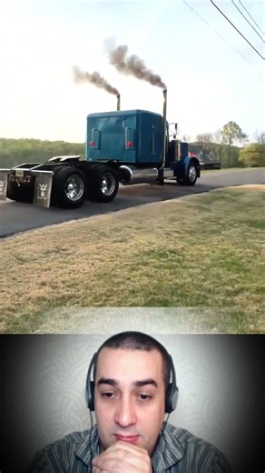 A semi truck ride near the house