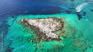 Aerial drone video of tropical exotic heart shape uninhabited island in exotic destination