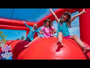 Elsa Surprises Kate and Lilly with a GIANT Inflatable Bounce House