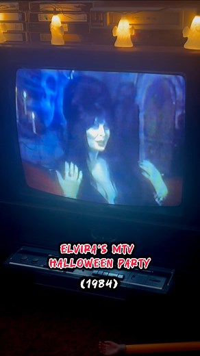 It’s Halloween night in 1984 and you’re watching Elvira’s MTV Halloween Party 👻🕸️ An hour of spooky tunes 🦇🎶, campy humor 😜, and pure 80s magic 🪩✨ #80s #genx #mtv #elvira #halloween #TVspecials #80smusic #trickortreat | 80s Deennice