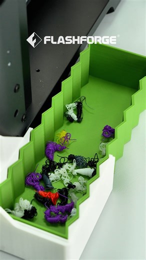 Flashforge on Instagram: "Catch this! Print a poop chute for your AD5X and keep things flowing smoothly. 🚽 Designer: @flashforge3dprinter Filament: Flashforge PLA Basic White/ PLA Matte Green STL file: Link in bio☝ #3dprinting #3dprinter #filament #flashforge #flashforgead5x #AD5X #FunctionalPrints"