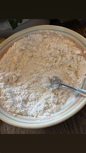 Making biscuits and gravy and bacon Start with a bowl similar to this one. 2 cups of self rising flour. White Lily if you can find it I’m not real fussy about exact measurements. If you don’t have buttermilk use about 1 tablespoon of vinegar or lemon juice in your milk. Use about 3/4 cups of milk. Use a little less than a stick of butter. I use my hands to mix really well. Then add the milk. Stir until well mixed and the flour is all mixed in with the milk. Get a hand full of four and put in bow