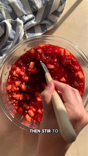 Cranberry Jello Salad is my go-to for a quick Thanksgiving side that looks gorgeous and tastes even better! 🍁👇 Ingredients ▢ 2 boxes raspberry jello 6 ounces total ▢ 1½ cups boiling water ▢ 1 can crushed pineapple 20 ounces ▢ 1 can whole berry cranberry sauce 15 ounces ▢ 1 apple Honeycrisp – peeled and chopped ▢ ½ cup pecans chopped ▢ ¾ cup cranberry juice Instructions 1. Add the jello powder to a mixing bowl and whisk in the boiling water. Whisk until the jello is dissolved completely. 2. Add