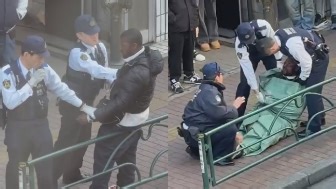 Japanese police burrito wrapping a violent black man