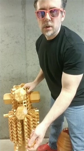 The clinical research on progressive overload and muscle growth recommends increasing about 2.5 pounds per week — that’s around 5½ ounces a day. I’ve taken that idea and made it even more precise - just 2 ounces per day. Every one of these little 2-ounce weights is 3D printed and filled with steel shot S70, which is basically steel sand. I've even added threaded inserts so you can keep stacking weight without removing any of the others. A finished column equals 1 pound, and a row equals 2 pounds