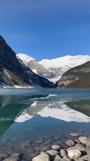 19K views · 330 reactions | Still mornings by the lake  We are seeing a lot of ice melt on #LakeLouise and are only a few days away from a full thaw! Who else is counting down the days? Check out our live webcam to catch the progress  https://tinyurl.com/f3fvnnzt #FairmontHotels #ThisIsCanada | Fairmont Chateau Lake Louise | Facebook